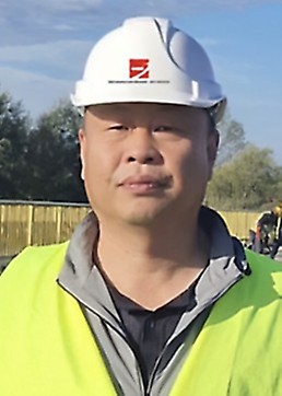 Mr. Wang, šef gradilišta
