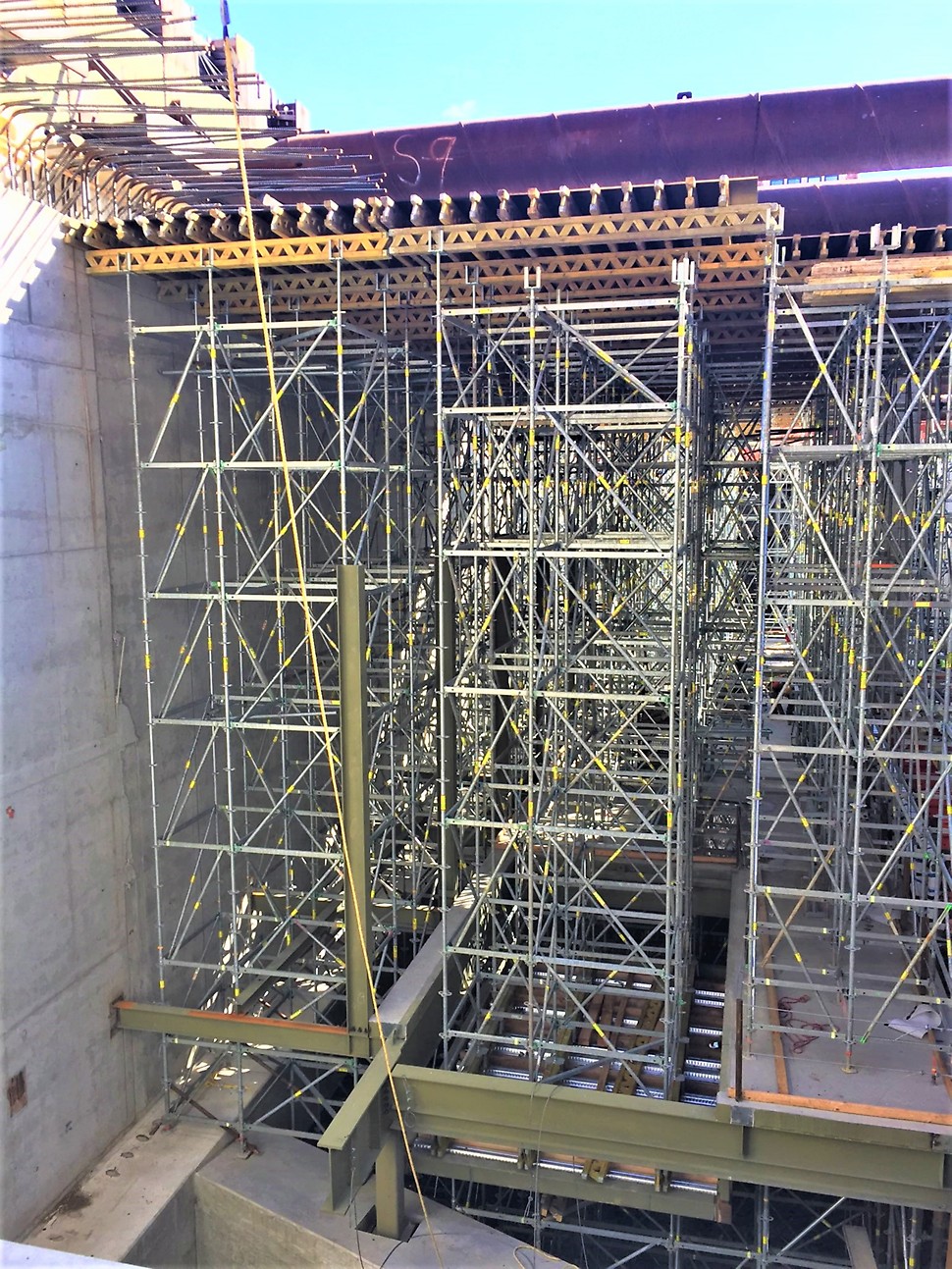 MULTIFLEX Girder Slab Formwork supported by 80+ ft. tall PERI UP Flex Shoring Towers
