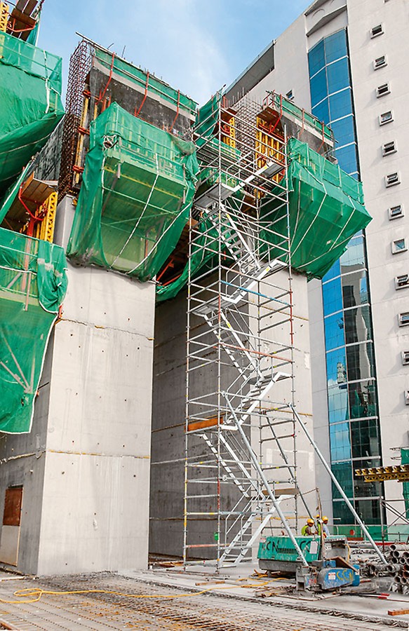 Maximum level of safety for all access means to the working areas: PERI UP Rosett staircases are the safe option for also reaching the higher storeys.