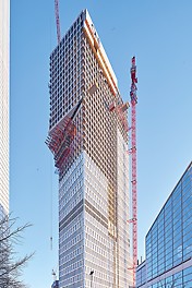 The cantilever at a height of 125 m gives the skyscraper its striking appearance, resembling the number “1”.