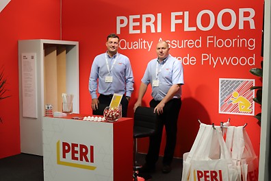 PERI FLOOR to showcase at The Flooring Show. Exhibition stand showing PERI employees promoting plywood products.