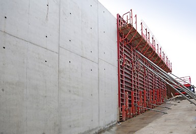 A construction site with MAXIMO Panel Formwork being used to build concrete walls.
