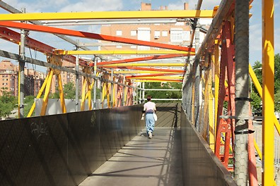 The ALPHAKIT pedestrian bridge serves as temporary shoring for allowing pedestrians to cross an obstruction.