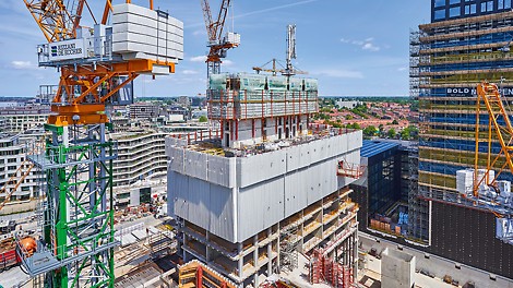 PERI made its mark with system-integrated safety solutions for the complex construction of the Y-Towers in Amsterdam. The building core of both towers was constructed with the help of an economical PERI system combination. Enormous wind loads were a particular challenge here, which is why both towers were equipped with a PERI climbing protection panel. This allowed safe working at great heights and minimized the risk of falling parts. In addition, the PERI self-climbing system allowed the concrete distributors to be easily moved upwards - without the use of a crane.