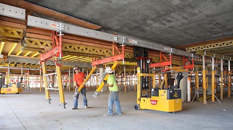 The legs of the beam table are simply hinged up before lowering the beam and rolling it to its next location.