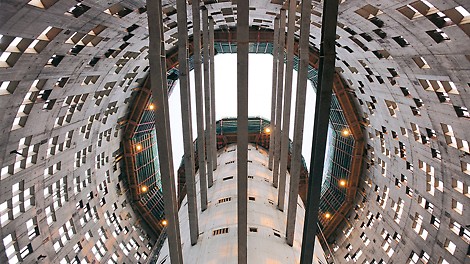 Torre Agbar, Barcelona, Spain - The cylindrical core and facade walls of this 142 m high office building were constructed with PERI ACS self-climbing technology.