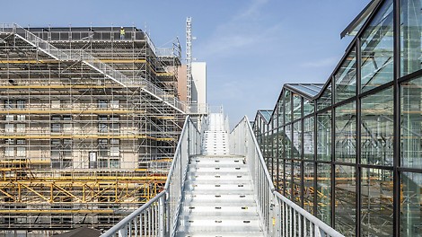 PERI UP Scaffolding Kit in use Erection of PERI UP Modular Scaffold and PERI UP Public Stair for the renovation of the chocolate factory. (Photo: PERI SE)