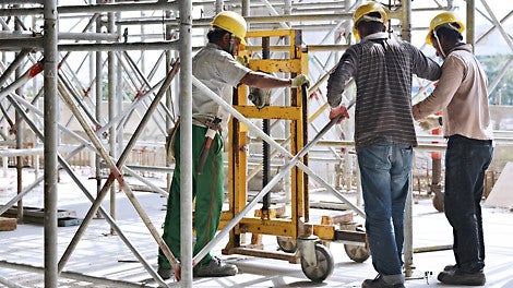 Workers are using the Trolley and Winch Unit for an easy horizontal movement.