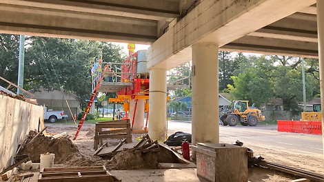 Perspective under the bridge to be widened with additional hammerhead caps adjacent to the existing bridge.