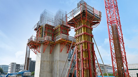 An upclose view of CB 240 Climbing Formwork system in the background and VARIO GT 24 Column Formwork system in the foreground.