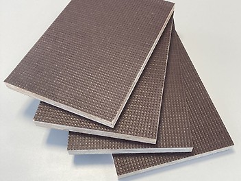 Slip-Resistant Plywood 4 squares of slip-resistant plywood stacked on top of each other.