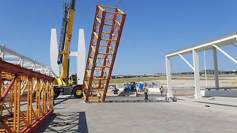 A crane was used to lift the VST Heavy-duty shoring tower. 