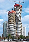 Absolute World, Missisauga, Canada - One climbing system – two climbing methods: with protection provided by the RCS climbing protection panel, the two twisting Absolute World towers rose steadily upwards in regular weekly cycles.
