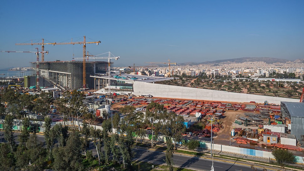 Overview of the Stavros Niarchos Foundation Cultural Center construction site with PERI scaffolding and formwork systems.