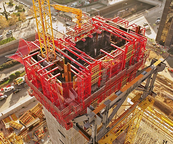 Cuatro Torres Business Area, Madrid, Spain - While planning the use of the self-climbing formwork for the reinforced concrete cores of the Torre Caja Madrid, PERI engineers also took into consideration the site crane which was positioned in the core.