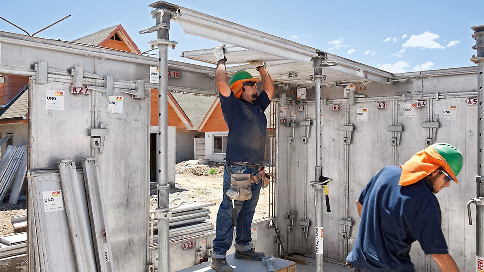 Construction worker manually uses the light-weight UNO element for the monolithic site-mixed concrete construction.