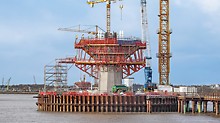 With horizontally-positioned SB Brace Frame Units, generously-sized working levels were realized; in addition, they facilitated the load transfer of the cantilevered concreting sections above into the pylon shaft.