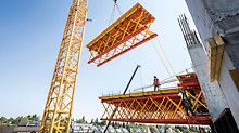 The VRB heavy-duty truss girders are assembled to create truss girder packages with platform units and extend from the building by around 9 m from level 4 upwards.