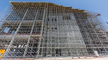 Continuous site supervision and a suitable logistic concept for the enormous amounts of scaffolding and formwork materials allow the tight schedule of the Stavros Niarchos Foundation Cultural Center project.