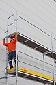The Easy* End Guardrail Frame installed in advance is mounted from the lower scaffold level in the next higher level as permanent end protection.