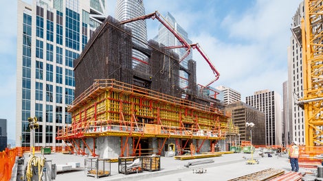 Self-climbing systems advance formwork, platforms independent of crane.