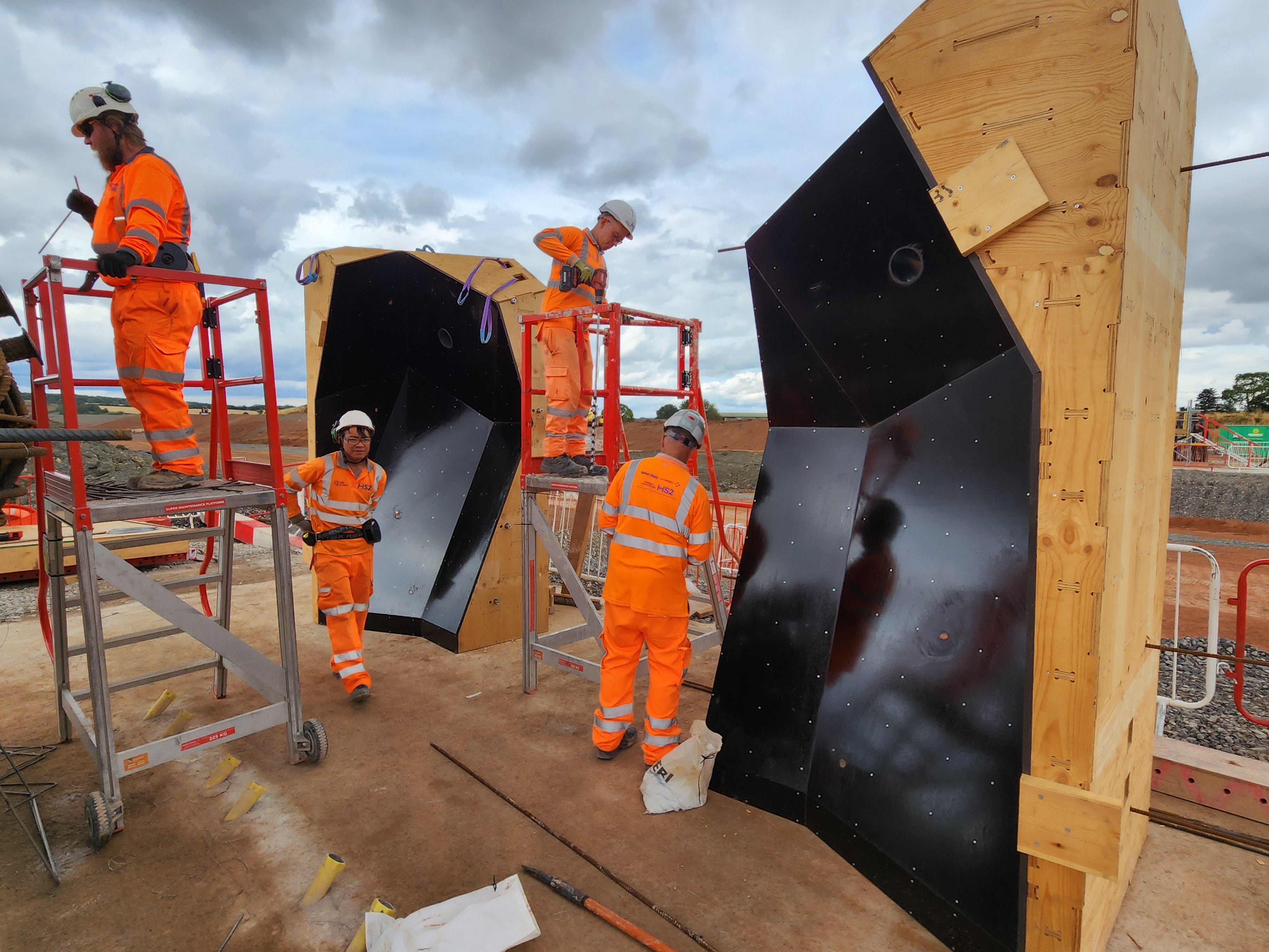 AI-designed bespoke formwork box outs manufactured using CNC technology for HS2 footbridge foundations in Warwickshire.