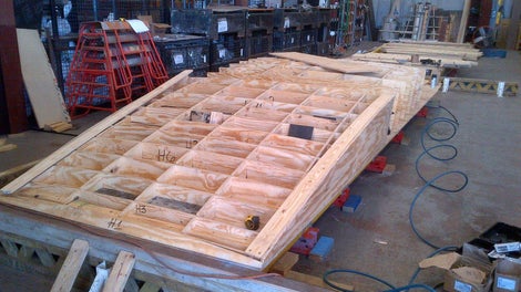 Creation of custom forms to accomodate sloped walls with architectural concrete finish.