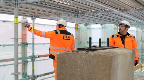 View from inside the PERI UP Cladding enclosure on the Old Cock Footbridge, showing how the translucent panels create a safe, bright, and contained working environment.