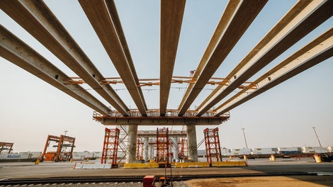 Pre-cast girder placement is made easier with the use of VST Shoring Towers.