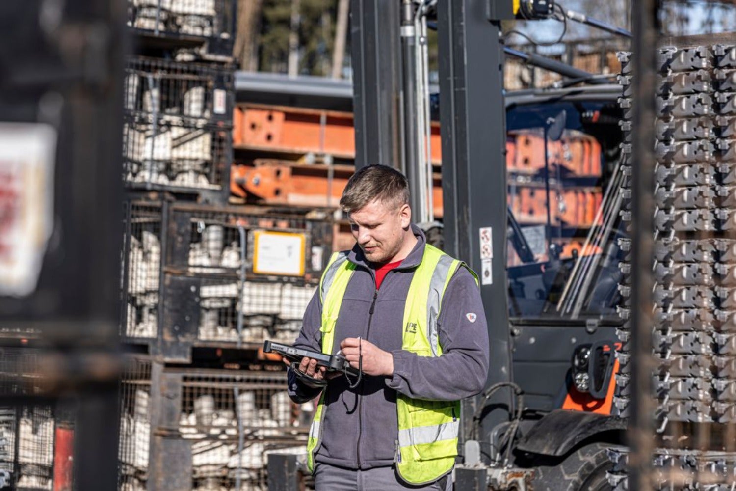 Through a large rental equipment park with numerous locations around the world