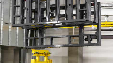 After dip coating, the components move on to powder coating, the final step in the process.