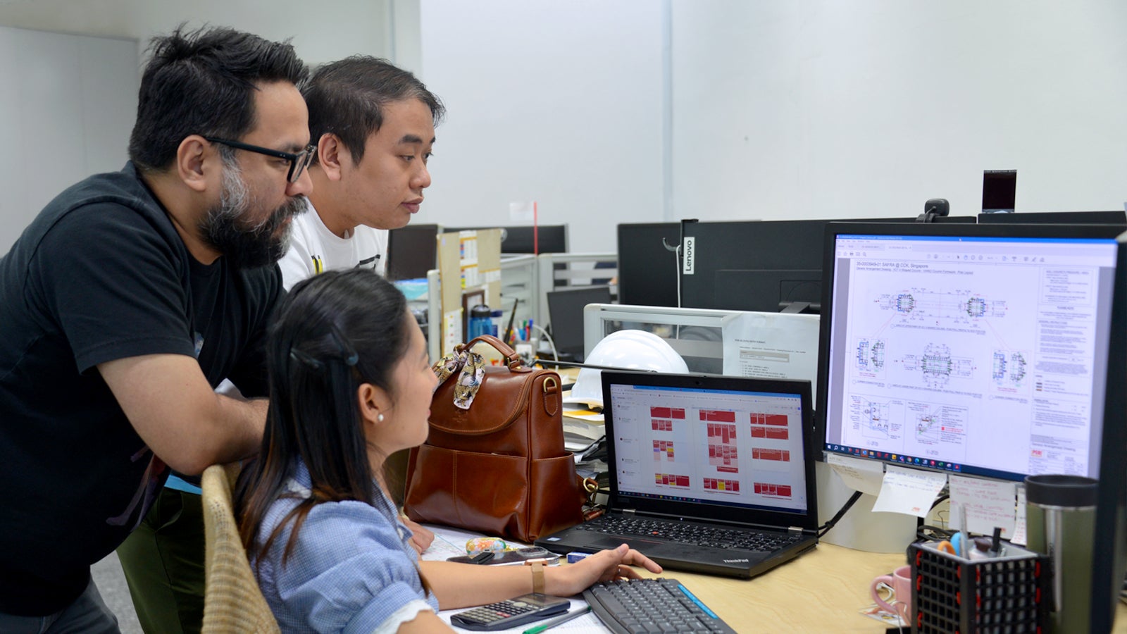 Head of Engineering, Roel Capulong and Senior Design Engineers, Jason Amaquin and Mechebelle Tabarno working on the SAFRA CCK project