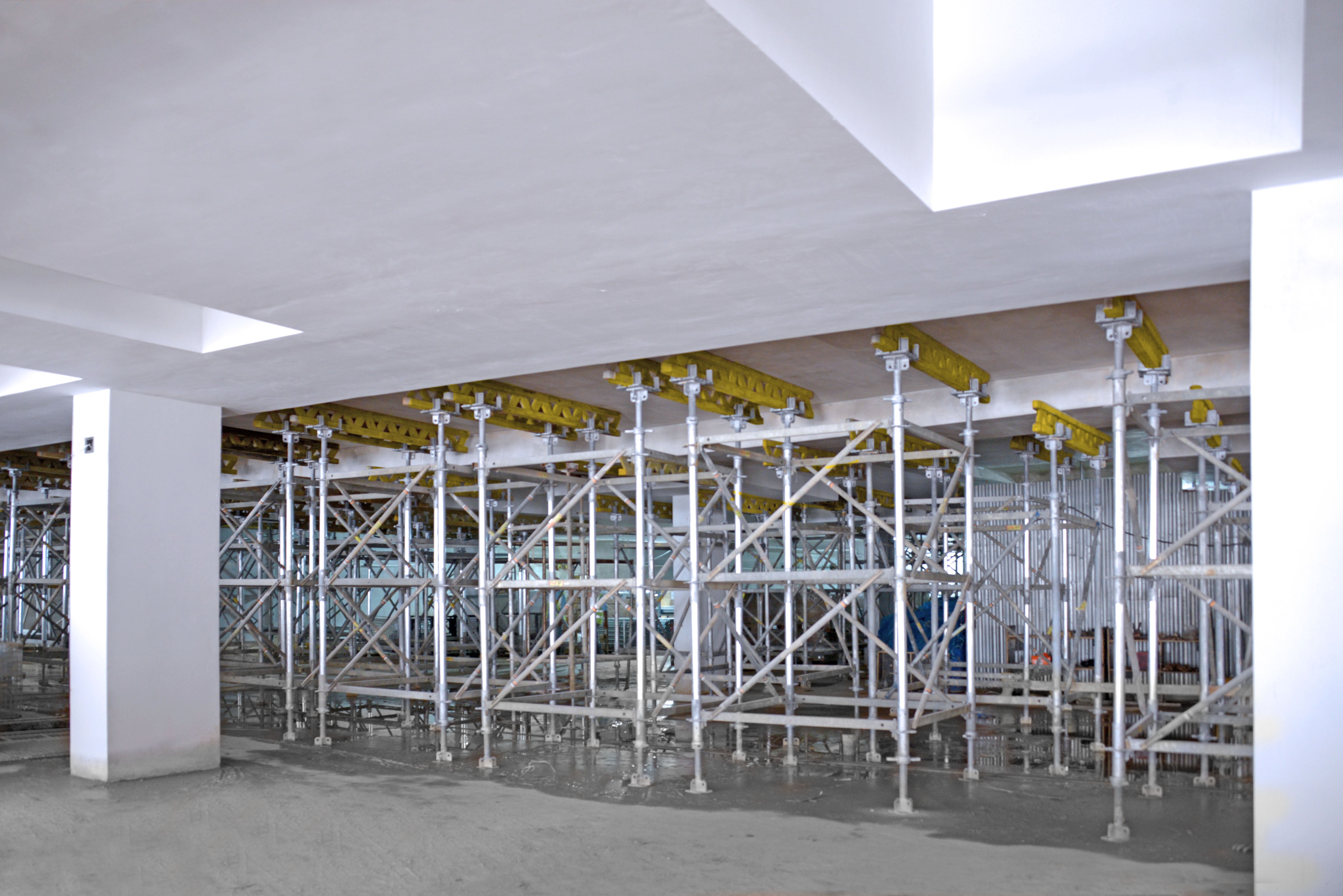 After the completion of first storey slab and beam, PS100 was later used as back prop to withstand 30kN per m²