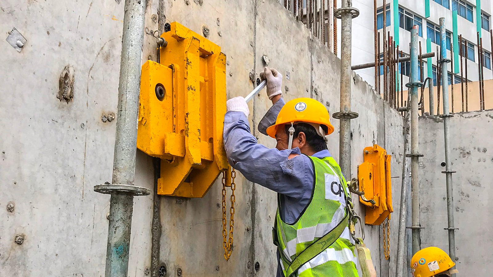 Installation works for the ACS wall shoe. The ACS system is used for climbing of the CPB.