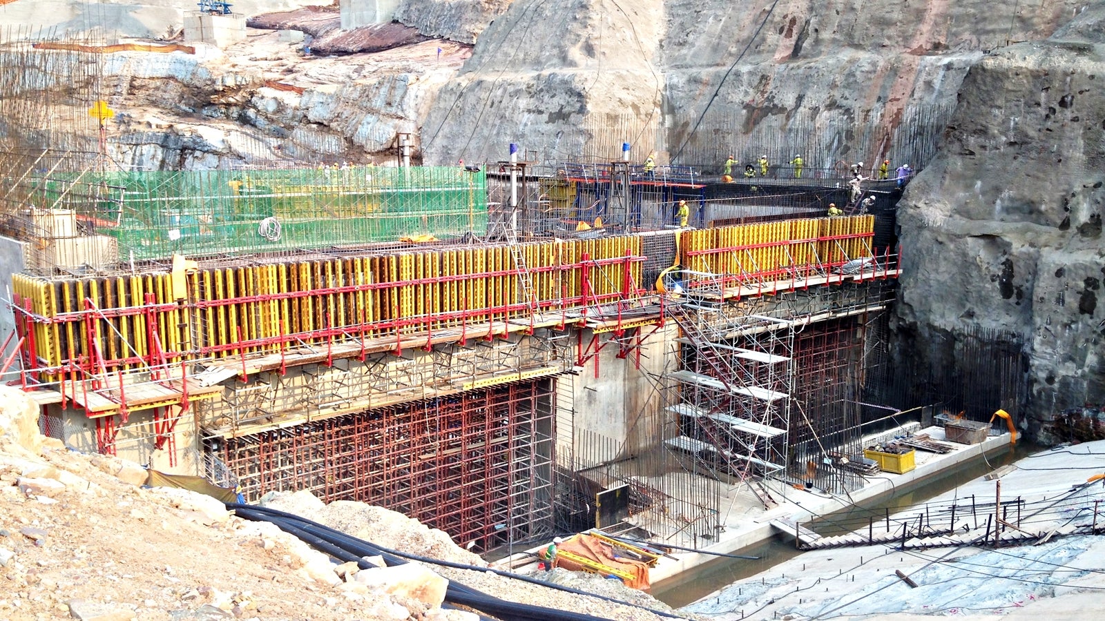The project includes two dams and power stations with the main dam's height of 148 m and the total capacity of 290 MW