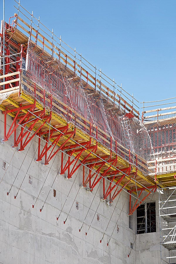 CB 240 framework brackets are connected with TRIO panel formwork to form large-sized climbing formwork units.
