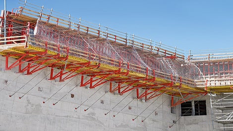 CB 240 framework brackets are connected with TRIO panel formwork to form large-sized climbing formwork units.
