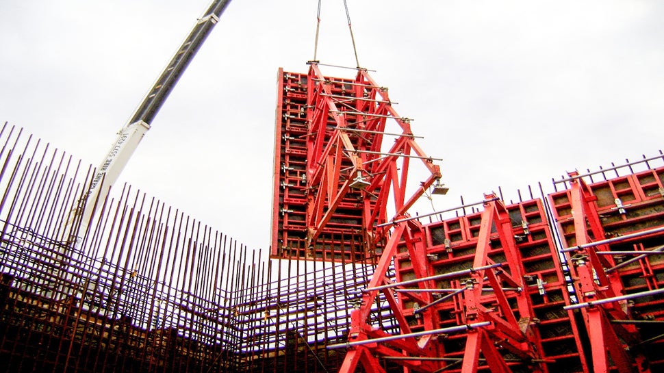 Lifting Trio SB into place.