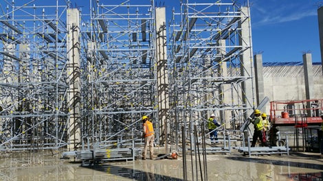 The crews are building the PERI UP Shoring Towers before flying on the tables