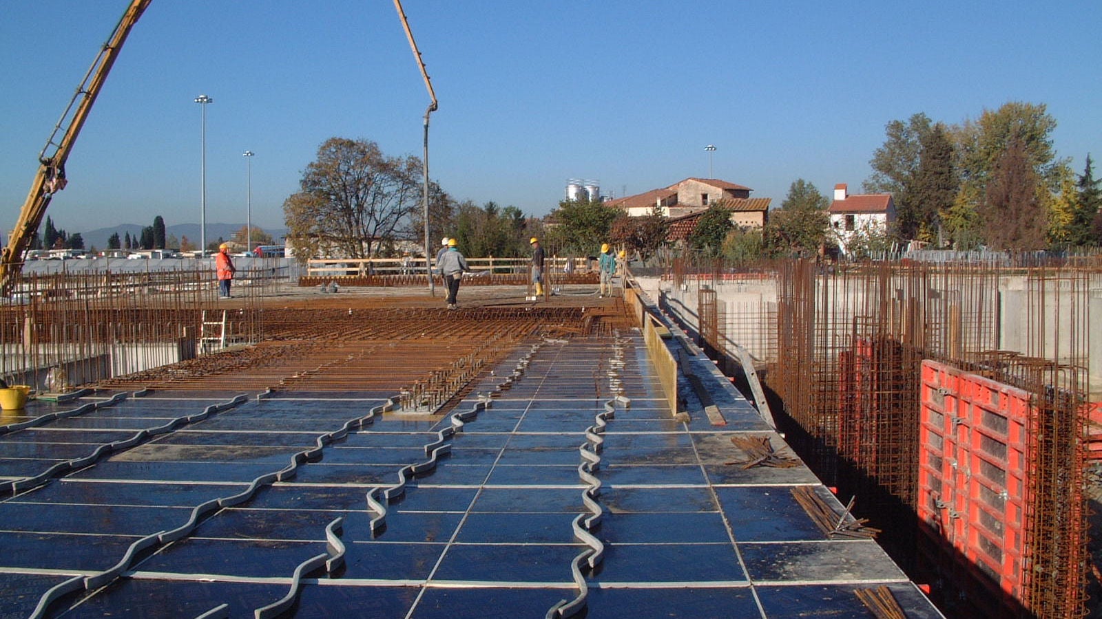 Dispositivi in fibrocemento per distanziare le armature inferiori del solaio dal cassero