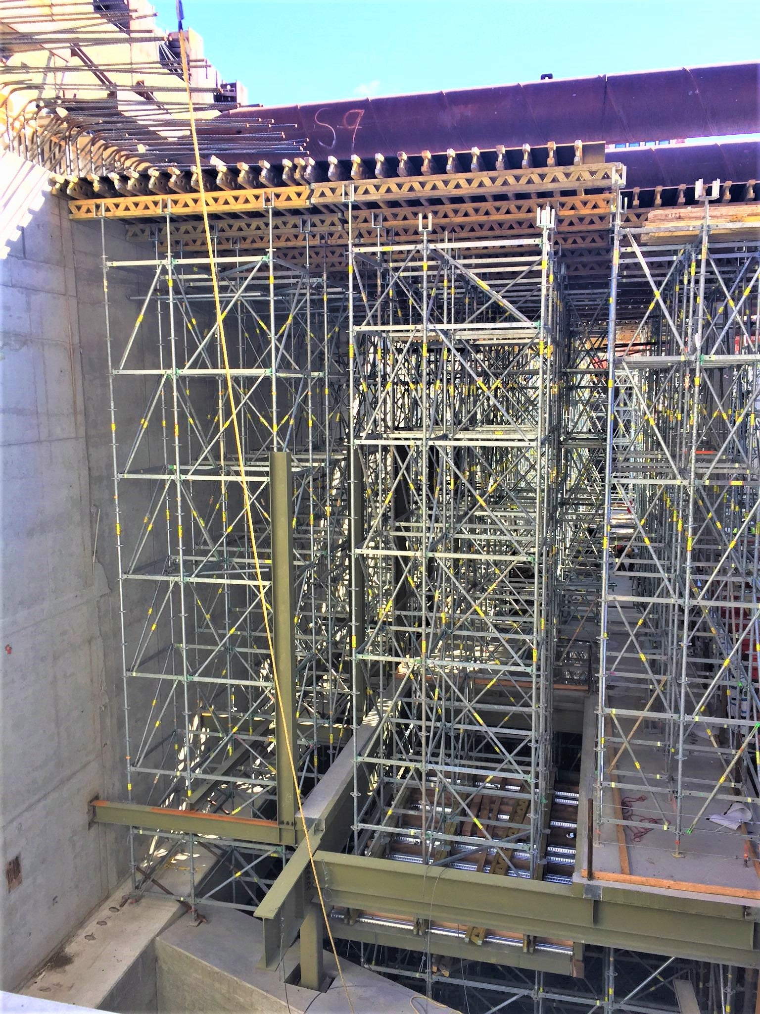 MULTIFLEX Girder Slab Formwork supported by 80+ ft. tall PERI UP Flex Shoring Towers