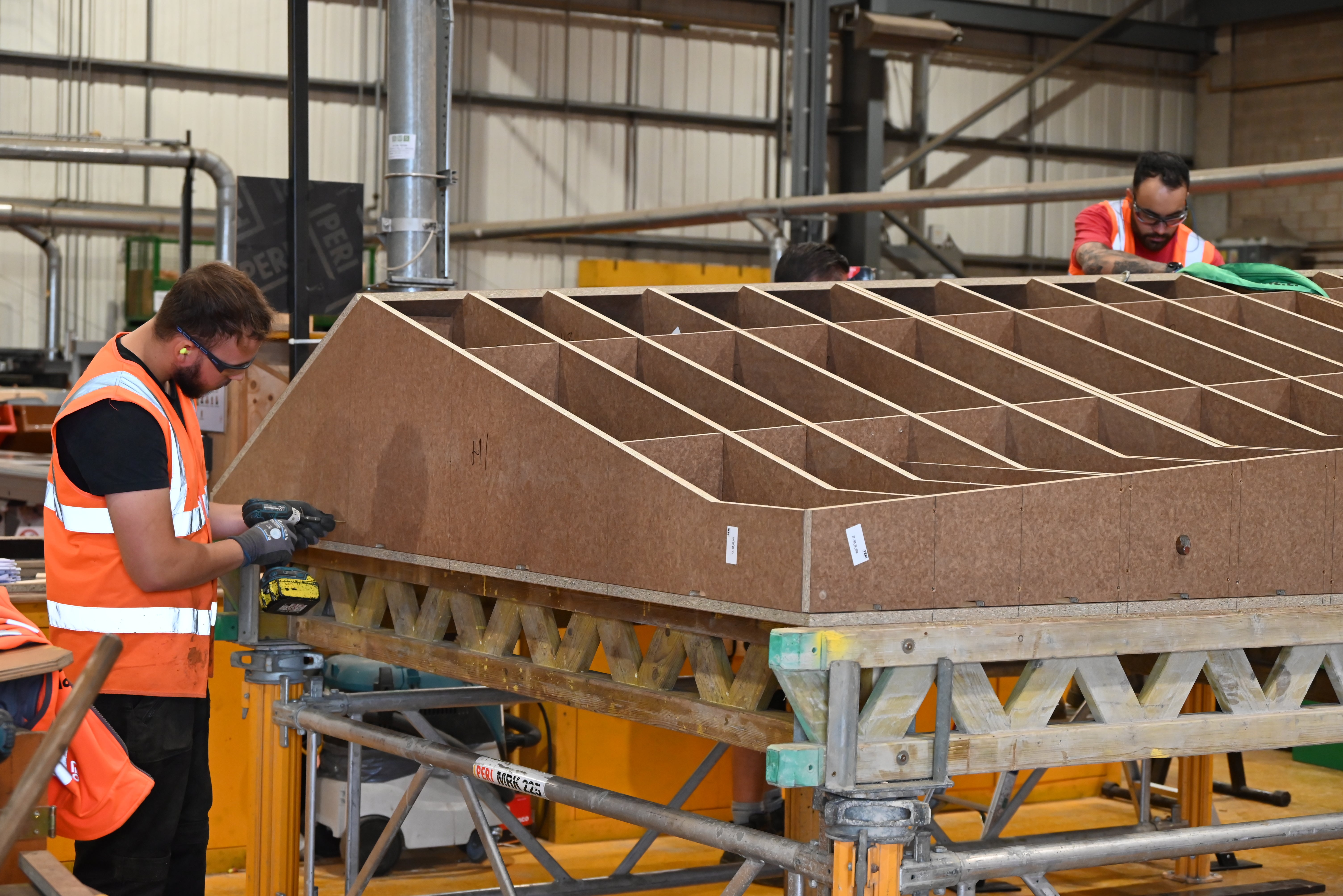 Smaller areas of damage to the formlining, mostly caused by concrete vibrators, are repaired with repair veneers.