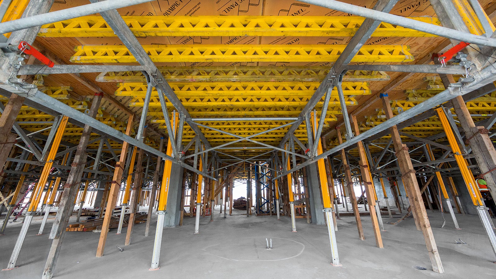 Pre-assembled SKYTABLE slab forming system makes high-rise construction fast and safe.