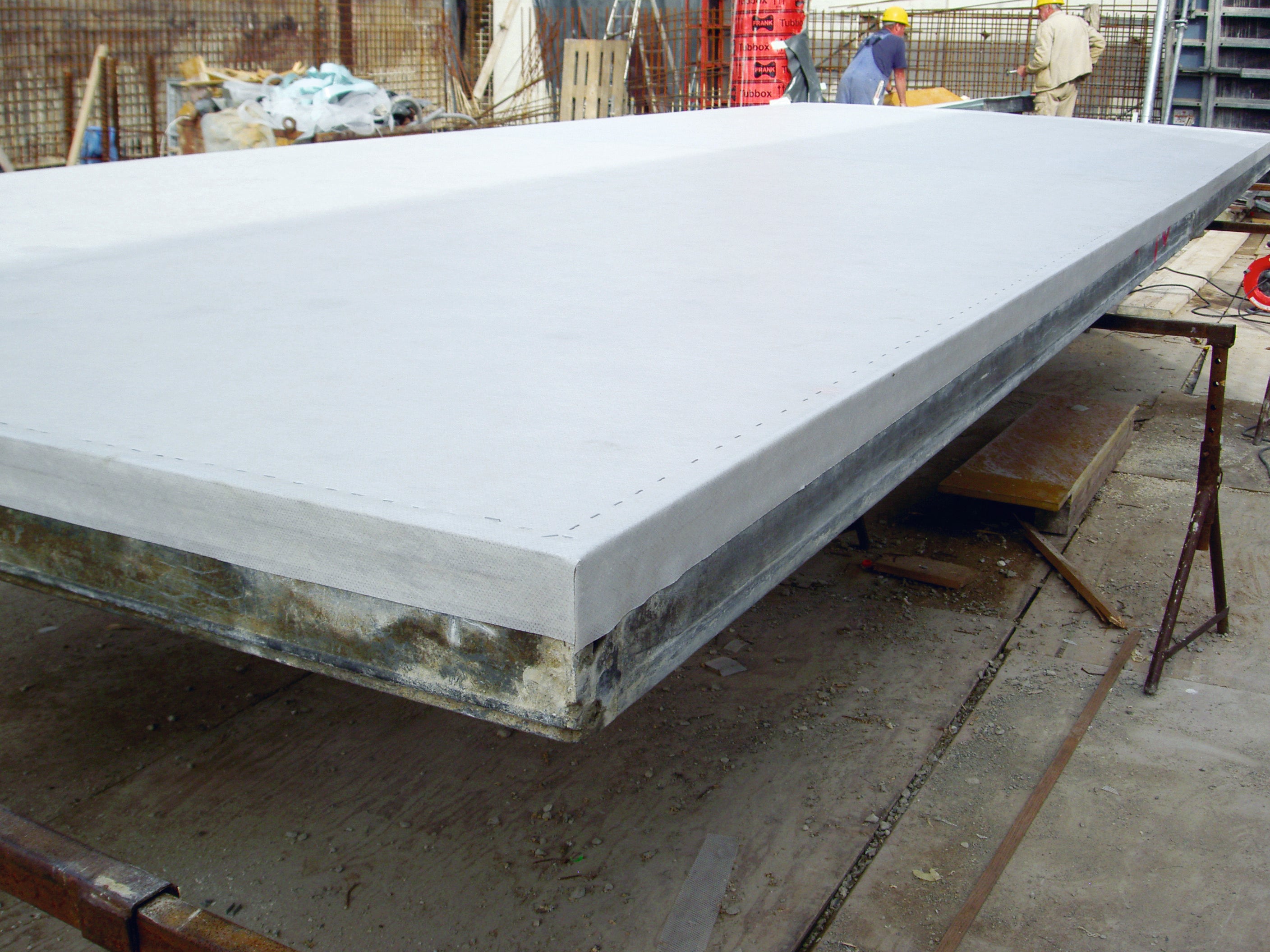 Revestimiento de encofrado de permeabilidad controlada