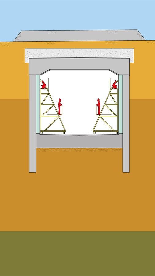 The tunnel slab was concreted after the diaphragm walls and rested on them. After that the excavation work started, beginning at the entrance portal.