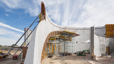 A collection of interlaced concentric arches define the outer walls of the National Veterans Memorial and Museum. 