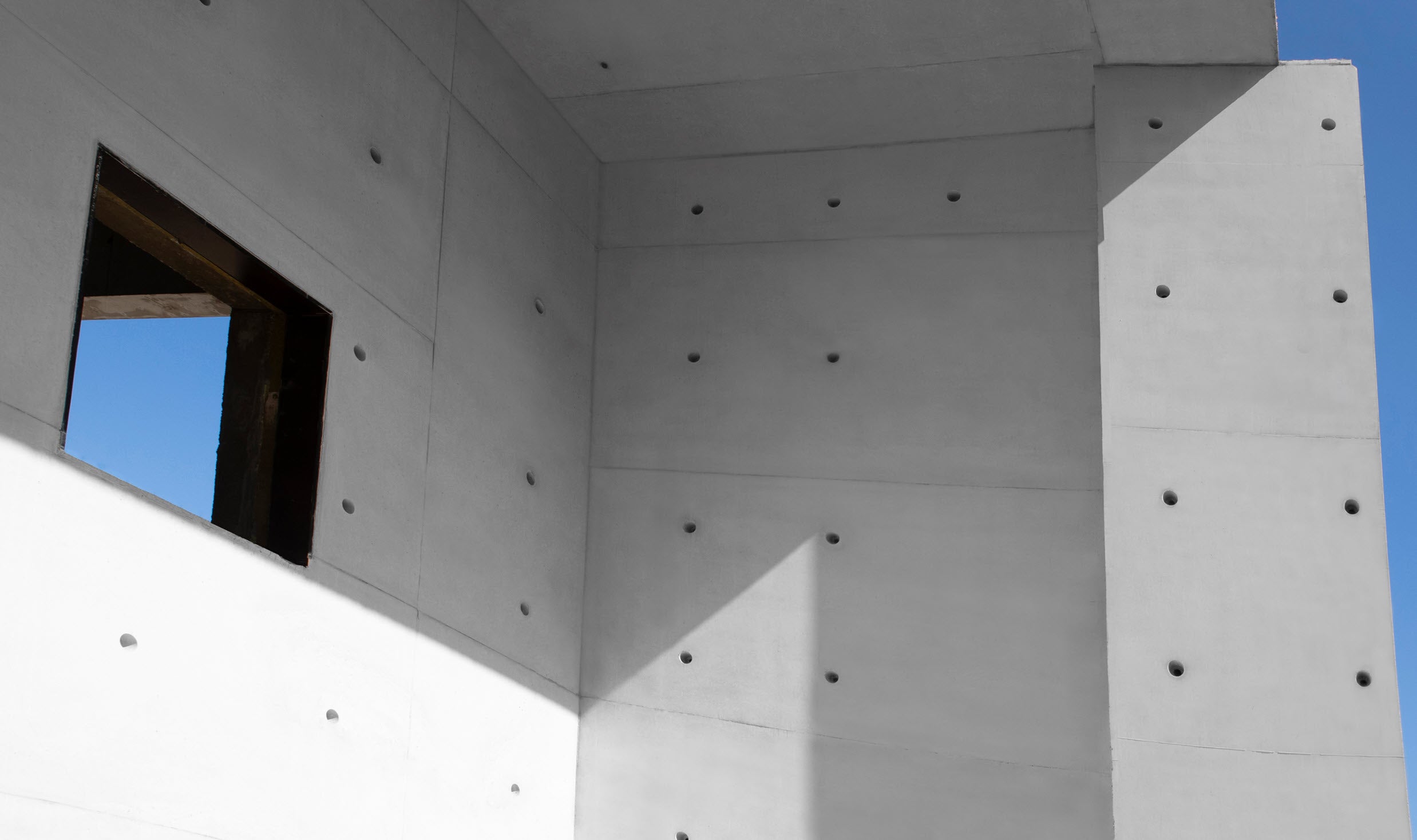 Architectural concrete finish of walls and slab in a building with high quality finish and tie patterns 