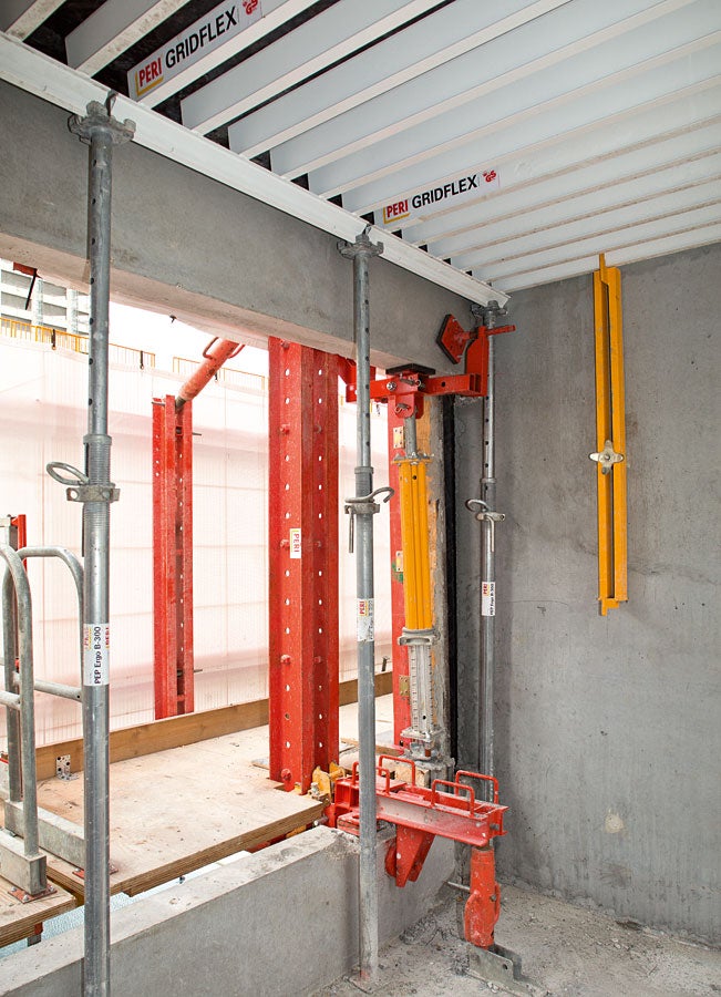 The climbing rails are held in position on the parapets of the basement levels and additionally fixed to the slab.