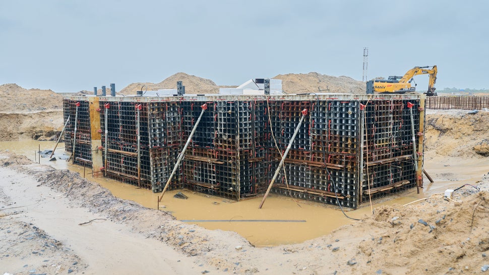 Construction of foundation blocks to carry gas compressor machinery. 180 cubic meter foundations with dimension 13m x 5m x 2.8m. The number of foundation blocks to be constructed is 10.