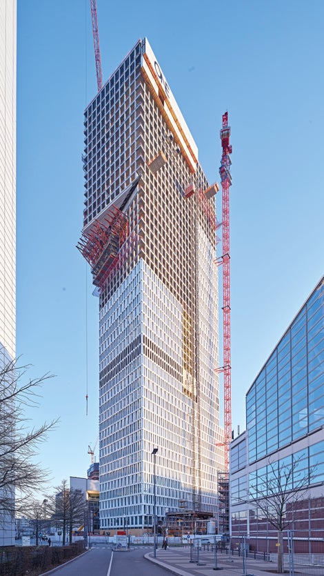 Die Auskragung in 125m Höhe verleiht dem Wolkenkratzer sein markantes Aussehen und lässt ihn an eine "1" erinnern.